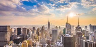 Manhattan skyline at sunset with dense skyscrapers