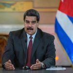 U.S. Indicts Maduro: Americans Tortured Nicolás Maduro speaking at a podium with a microphone