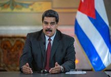 U.S. Indicts Maduro: Americans Tortured Nicolás Maduro speaking at a podium with a microphone