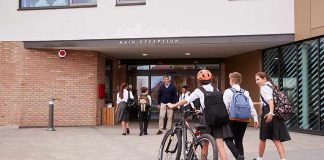 School Shooting: Three Children, One Adult Dead Students in uniforms arriving at a school entrance
