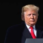 Trump Rages at Secret Service in the Middle of a Storm Donald Trump at a podium with a microphone