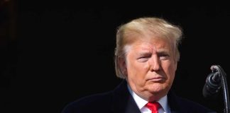 Trump Rages at Secret Service in the Middle of a Storm Donald Trump at a podium with a microphone