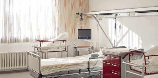 Lawmaker Struck By Car – Both Legs Amputated A hospital room featuring empty patient beds and medical equipment