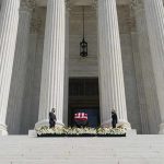Long-Serving House Speaker Dies At 84 Flag-draped casket on courthouse steps between towering columns