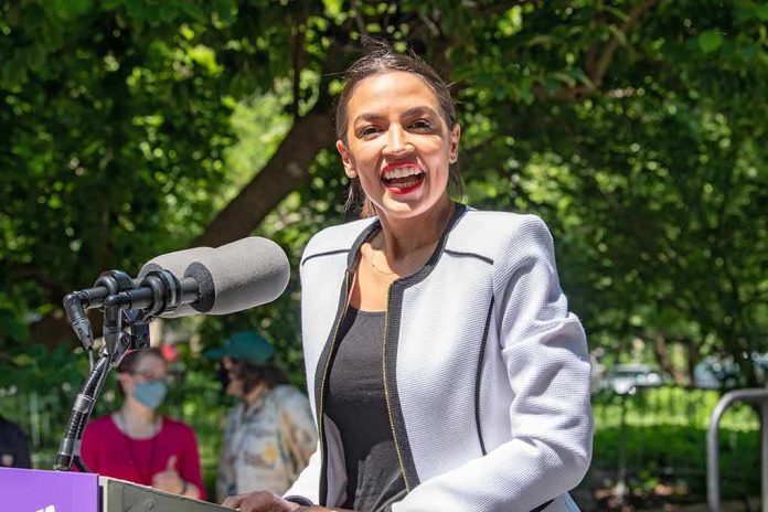 shutterstock_1986192140 Woman speaking at an outdoor podium with microphone