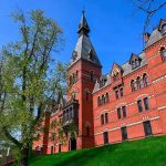 Ivy Leagues Cancel ALL Frat Events For Rest of the Year Historic red brick building with tower on a sunny day
