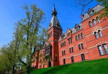Ivy Leagues Cancel ALL Frat Events For Rest of the Year Historic red brick building with tower on a sunny day