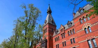 Ivy Leagues Cancel ALL Frat Events For Rest of the Year Historic red brick building with tower on a sunny day